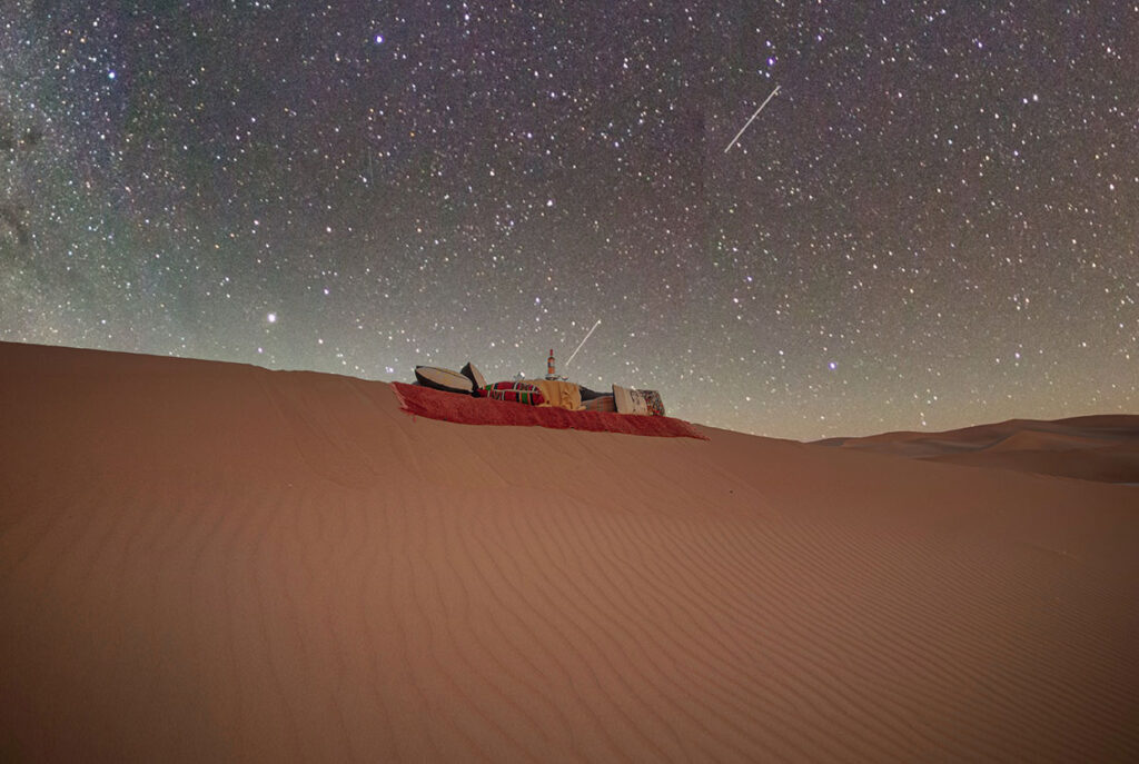 An interior shot of a luxury desert tent showcasing elegant furnishings